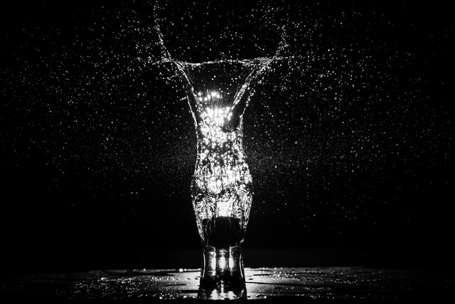 Family drinking fresh water at home.
